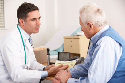 A man consults with a medical professional
